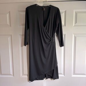 Beautiful black wrap dress with buckle detail. L. EUC.